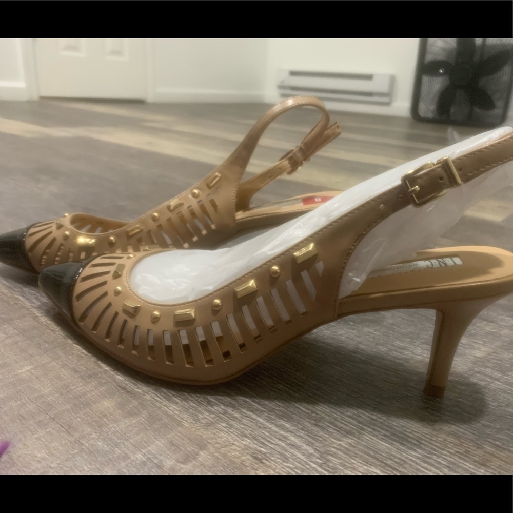 New never used bought at macys like almost all her shoes.